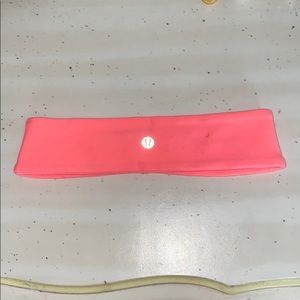 Coral lululemon headband with black bag